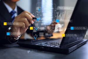 Businessman using pen to tick on checkmark with virtual screen for digital electronic document approval or online questionnaire and dashboard to show chart and graph information for decision making Information Governance